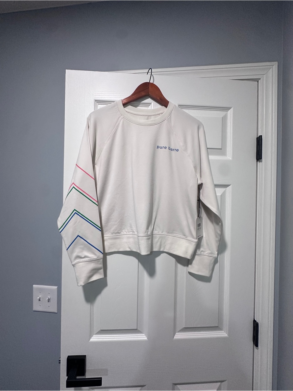 Pure Barre Cream Crewneck Sweatshirt with Rainbow Chevron Sleeve